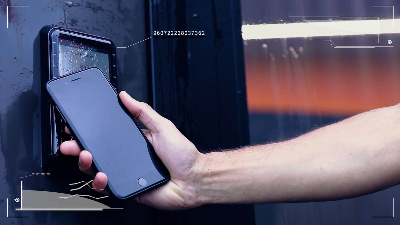 A person unlocking a door with their cell phone